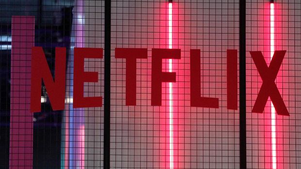 FILE- In this Nov. 4, 2017, file photo, the logo of American entertainment company Netflix is pictured at the Paris games week in Paris. Netflix, Inc. reports earnings Monday, April 16, 2018. (AP Photo/Christophe Ena, File)