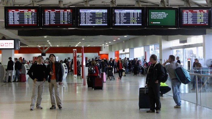 MELBOURNE, AUSTRALIA - JUNE 22:  Passengers wait for flights at Melbourne International Airport on June 22, 2011 in Sydney, Australia. Flights across Australias busiest airports are resuming today after cancellations due to the Chilean ash cloud yesterday stranded passengers and created a backlog.  (Photo by Hamish Blair/Getty Images)