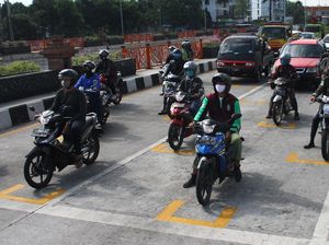 Sensasi Balap ala MotoGP di Lampu Merah Malang