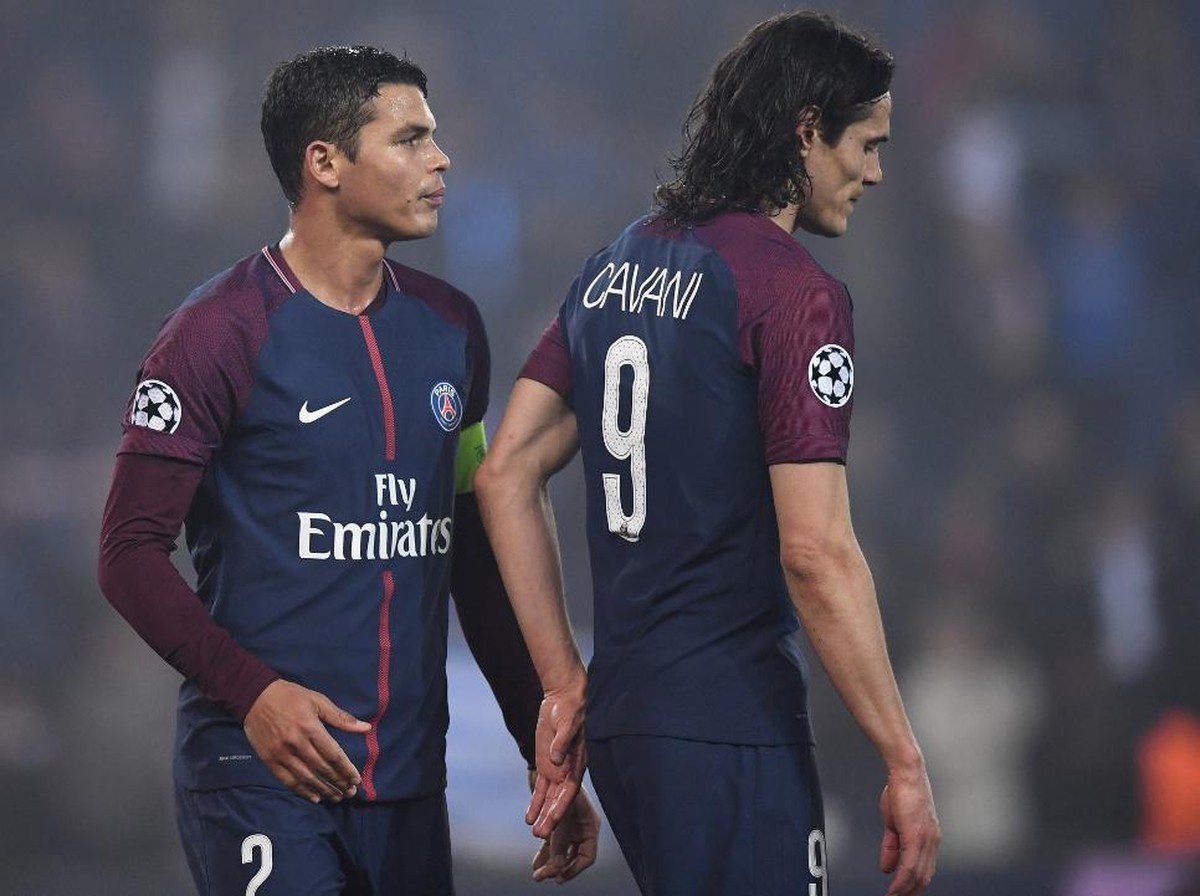 Thiago Silva dan Edinson Cavani saat masih berseragam Paris Saint-Germain. (Foto: FRANCK FIFE/AFP)