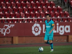 Terlepas dari rupa wajahnya yang baru, Lionel Messi bisa membawa Barcelona menang atas Real Mallorca 4-0. Dia mencetak satu gol dan dua assist (AFP/JAIME REINA)