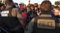Unjuk rasa ini sebagai bentuk protes atas penembakan pria kulit hitam Rayshard Brooks oleh polisi Atlanta.