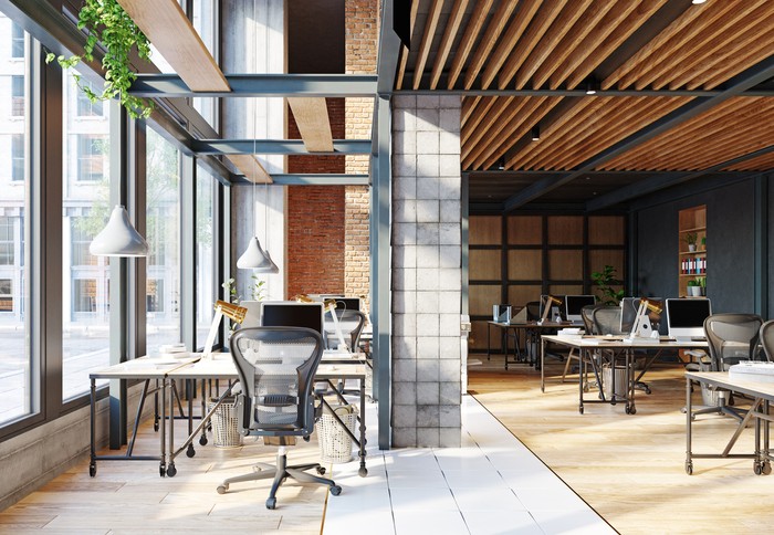 Tren Interior Rumah dan Kantor di Era New Normal Large and modern office interiors. 3D rendering of fully furnished big office space.
