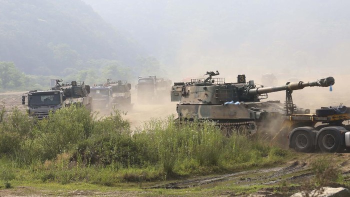 A South Korean army soldier patrols at the Unification Bridge, which leads to the Panmunjom border village in the Demilitarized Zone in Paju, South Korea. Tuesday, June 16, 2020. North Korea blew up an inter-Korean liaison office building just inside its border in an act Tuesday that sharply raises tensions on the Korean Peninsula amid deadlocked nuclear diplomacy with the United States. (AP Photo/Ahn Young-joon)
