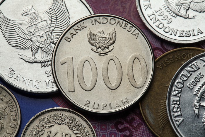 ilustrasi uang koin 1000
