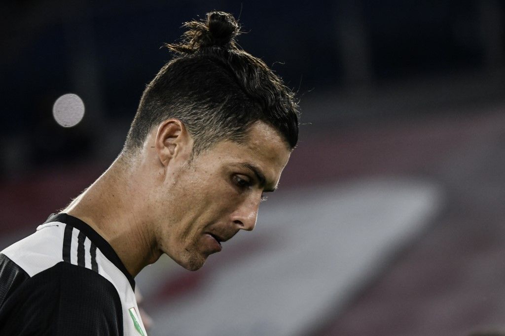 Ronaldo Juventus' Portuguese forward Cristiano Ronaldo reacts after Juventus lost the TIM Italian Cup (Coppa Italia) final football match Napoli vs Juventus on June 17, 2020 at the Olympic stadium in Rome, played behind closed doors as the country gradually eases the lockdown aimed at curbing the spread of the COVID-19 infection, caused by the novel coronavirus. (Photo by Filippo MONTEFORTE / AFP)