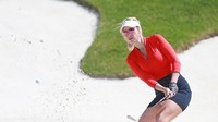 Kemolekan sosok 27 tahun asal AS ini acapkali membuatnya dijuluki pegolf seksi. (Foto: AFP/Matt SULLIVAN)