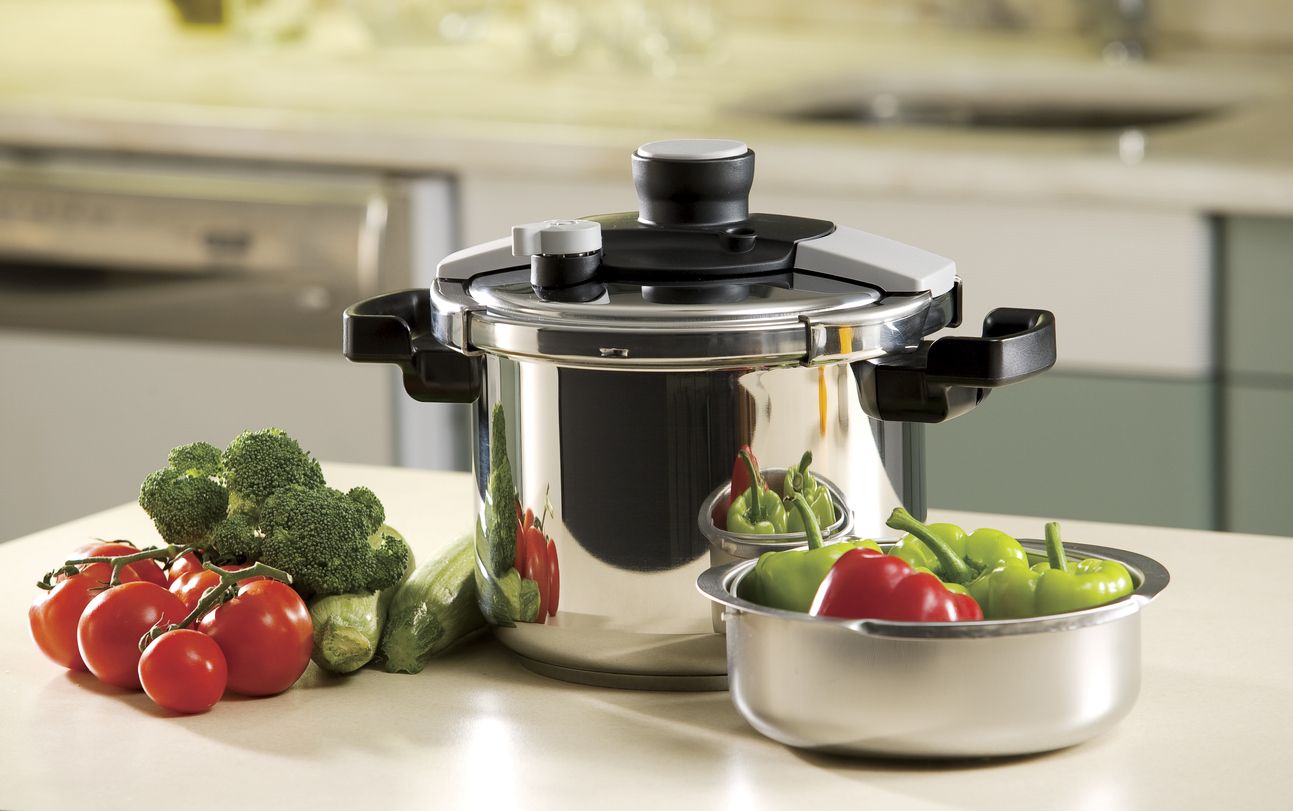 Pressure cooker; photo about stove in the kitchen.