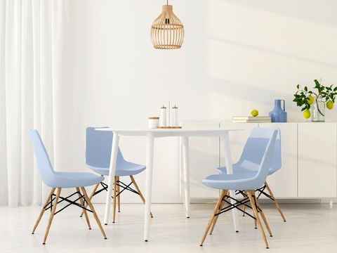 Modern interior cozy kitchen, dining room, white furniture, lamps, wooden table, red wine, glasses. Concept decor, design, advert, credit, mortgage, house for young family, magazine cover