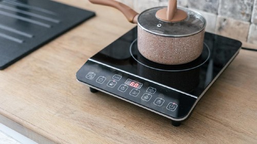 Ilustrasi kompor induksi, kompor listrik