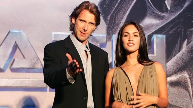 SEOUL, SOUTH KOREA - JUNE 11: U.S. film director Michael Bay and actress Megan Fox attend a photocall before a press conference to promote their new film 