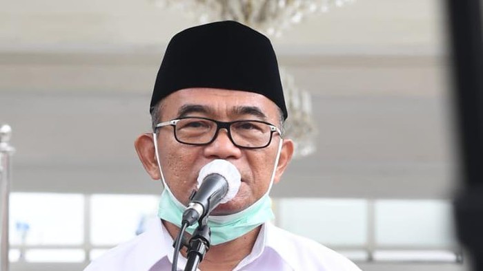 Menko PMK Muhadjir Effendy seusai bertemu Presiden Jokowi di Istana.