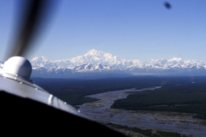 FILE - In this April 24, 2016, file photo, an airplane prepares to take off from an area where a base camp was being set up for climbers to begin their ascent of Denali near Talkeetna, Alaska. Talkeetna businesses are suffering in the financial pinch caused by the coronavirus, which led to the national park canceling this years climbing season and the cancelation of summer seasons by most major cruise companies, meaning nearly half of Alaskas 2.2 million visitors had their trips canceled this year. (AP Photo/Mark Thiessen, File)