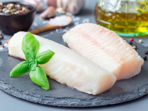 Fresh raw pangasius fish isolated on white background