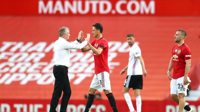 Manchester United Vs Sheffield United MANCHESTER, ENGLAND - JUNE 24: Ole Gunnar Solskjaer, Manager of anchester United interacts with Nemanja Matic after the Premier League match between Manchester United and Sheffield United at Old Trafford on June 24, 2020 in Manchester, England. (Photo by Michael Steele/Getty Images)