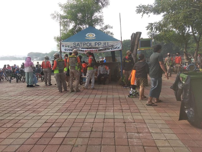 Suasana CCFD Danau Sunter Selatan dijaga Aparat