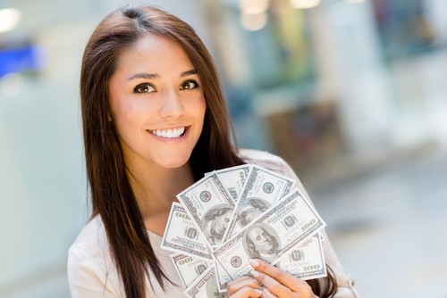 happy Asian woman hand holding smart phone and banknotes ,make money online concept