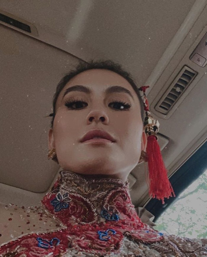 Heboh Agnez Mo Lamaran Usai Unggah Foto dengan Cheongsam, Ini Faktanya