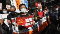 Langkah ini dipandang sebagai perubahan paling signifikan sejak Hong Kong meninggalkan pemerintahan Inggris pada tahun 1997. Para kritikus menilai UU ini sebagai ancaman langsung terhadap kebijakan satu negara, dua sistem yang memberi Hong Kong peningkatan kebebasan demokrasi. AP Photo/Vincent Yu.