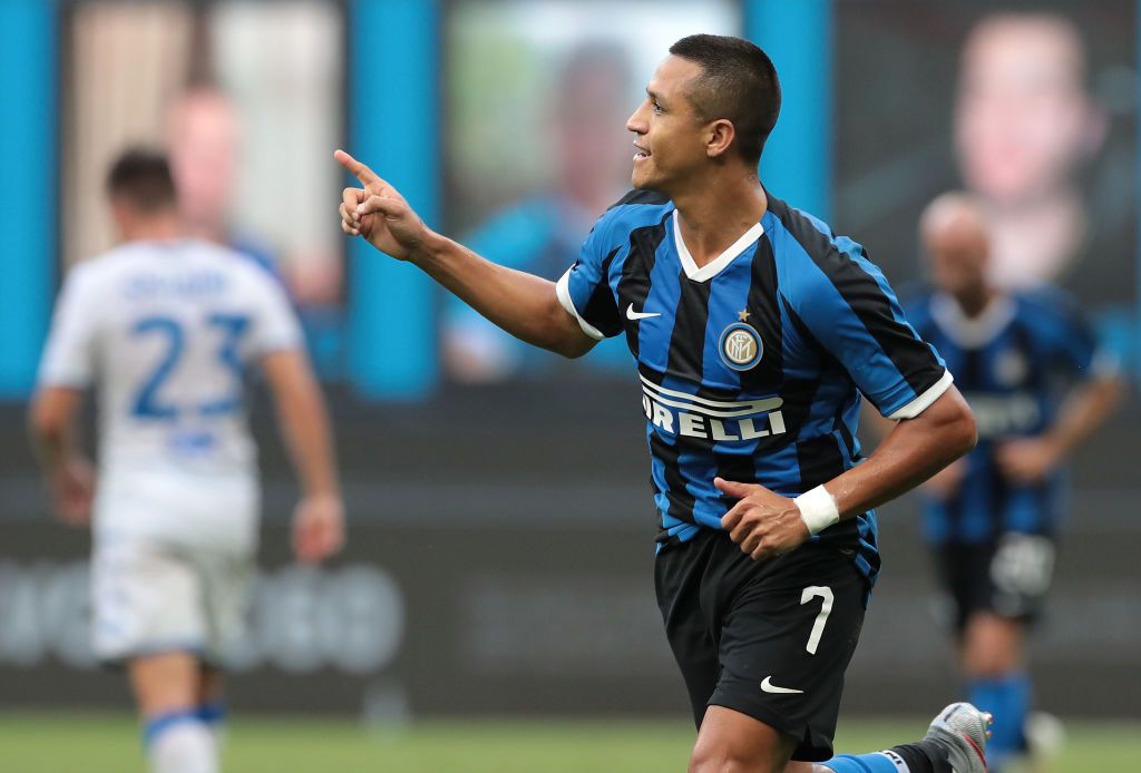1223815423 MILAN, ITALY - JULY 01: Alexis Sanchez of FC Internazionale celebrates after scoring the second goal of his team via penalty during the Serie A match between FC Internazionale and Brescia Calcio at Stadio Giuseppe Meazza on July 1, 2020 in Milan, Italy. (Photo by Emilio Andreoli/Getty Images)
