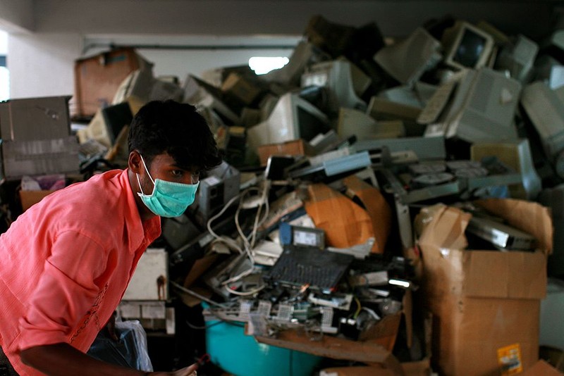 BANGALORE, INDIA - APRIL 13: (ISRAEL OUT) Old computers and electronic parts are for sale at a local market, April 13, 2008 in Bangalore, India. India's growing digital economy has contributed to the amount of e-waste it generates. According to the Karnataka, a state pollution control board, more then 10 tones of electronic waste is produced in Bangalore alone every year and about 80 per cent of e-waste generated in the US is exported to India, China and Pakistan to be recycled. (Photo by Uriel Sinai/Getty Images)