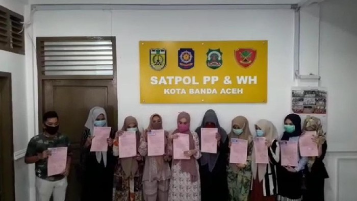 Sekelompok pesepeda wanita di Aceh yang foto pose di pantai sempat viral di medsos diamankan. Mereka meminta maaf dan membuat pernjanjian tak mengulangi perbuatan (Screenshot video)