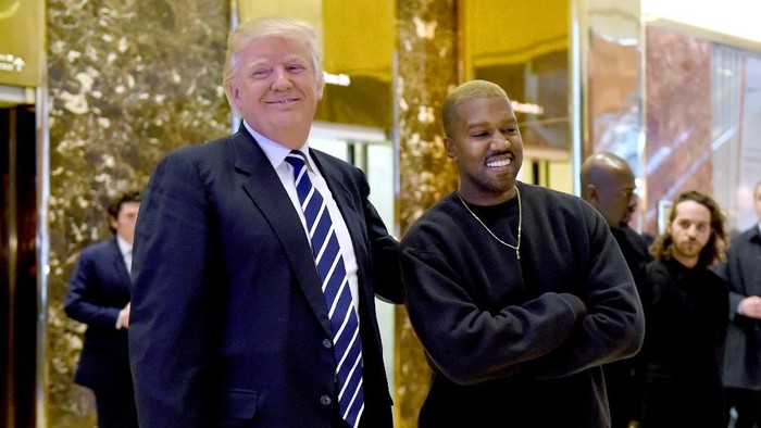 Singer Kanye West and President-elect Donald Trump speak with the press after their meetings at Trump Tower December 13, 2016 in New York. (Photo by TIMOTHY A. CLARY / AFP)