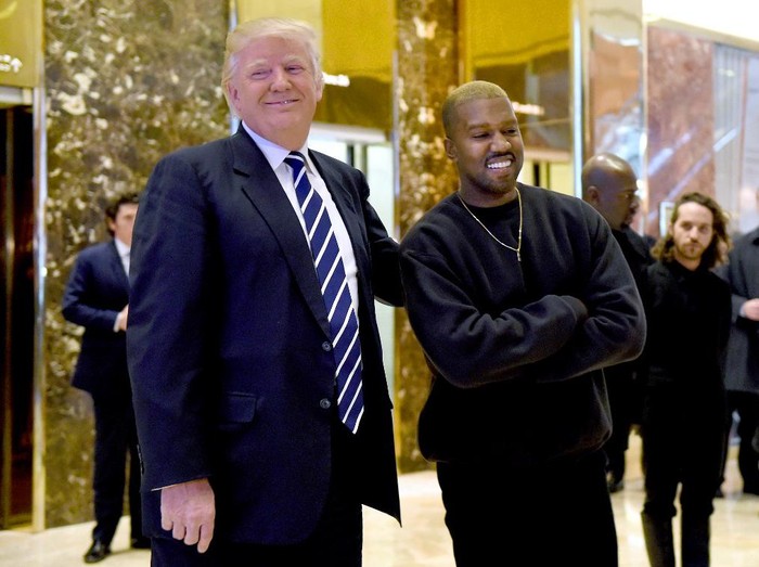 Singer Kanye West and President-elect Donald Trump speak with the press after their meetings at Trump Tower December 13, 2016 in New York. (Photo by TIMOTHY A. CLARY / AFP)