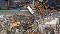 Kerusakan di wilayah Kuma, Jepang, akibat banjir, 8 Juli 2020. Carl Court/Getty Images.