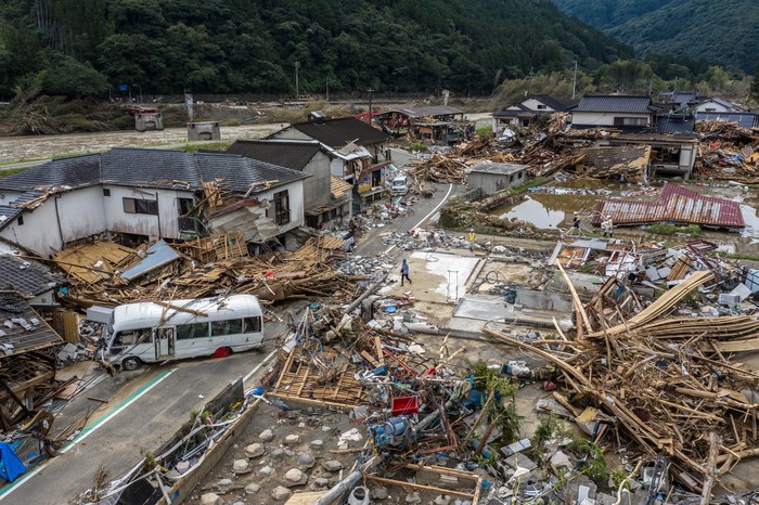 A landslide is seen near an exit of a highway in Kyoto, western Japan Thursday, July 9, 2020. Pounding rain spread to central Japan and triggered mudslides. (Kyodo News via AP)