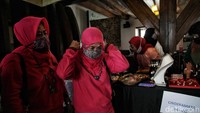 Peserta diwajibkan memakai masker.