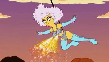 Episode Lisa Goes Gaga meramalkan kostum yang akan dikenakan Lady Gaga. Benar saja, pada Super Bowl ia muncul dengan pakaian serupa. Hmm ini bisa jadi sih karena memang terinspirasi dari The Simpsons kali ya. Foto: Fox via The Warp