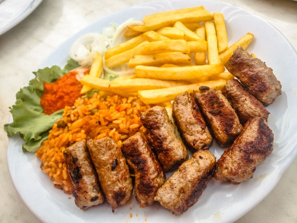Traditional Serbian cheese pie gibanica and spinach pie in plate