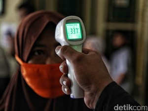 Terpopuler Sepekan: Hoax! Thermo Gun Tidak Merusak Otak, Ini Kata Para Pakar