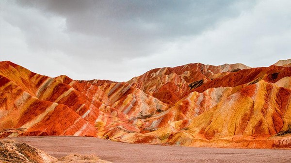 Zhangye Global Geopark UNESCO memiliki bukit berwarna-warni, contohnya daratan Danxia yang terbentuk oleh batu pasir dengan berbagai warna. (UNESCO) Zhangye Global Geopark UNESCO memiliki bukit berwarna-warni, contohnya daratan Danxia yang terbentuk oleh batu pasir dengan berbagai warna. (UNESCO)