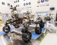 FILE - In this Thursday, Nov. 14, 2019 file photo, a Mars lander is lifted during a test for its hovering, obstacle avoidance and deceleration capabilities at a facility at Huailai in Chinas Hebei province. The site outside Beijing simulated conditions on the red planet, where the pull of gravity is about one-third that of Earth. China will launch their Mars rover and an orbiter sometime around July 23, 2020, in a mission named Tianwen, or Questions for Heaven. (AP Photo/Andy Wong)