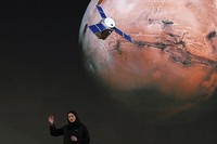 FILE - In this Thursday, Nov. 14, 2019 file photo, a Mars lander is lifted during a test for its hovering, obstacle avoidance and deceleration capabilities at a facility at Huailai in Chinas Hebei province. The site outside Beijing simulated conditions on the red planet, where the pull of gravity is about one-third that of Earth. China will launch their Mars rover and an orbiter sometime around July 23, 2020, in a mission named Tianwen, or Questions for Heaven. (AP Photo/Andy Wong)