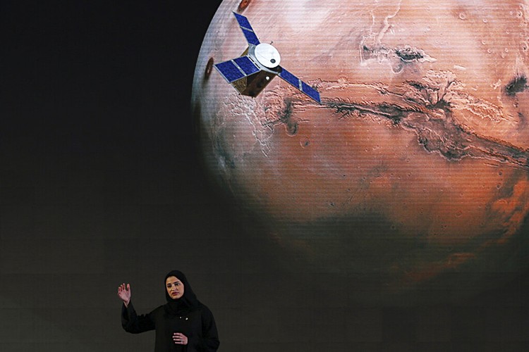 FILE - In this Thursday, Nov. 14, 2019 file photo, a Mars lander is lifted during a test for its hovering, obstacle avoidance and deceleration capabilities at a facility at Huailai in Chinas Hebei province. The site outside Beijing simulated conditions on the red planet, where the pull of gravity is about one-third that of Earth. China will launch their Mars rover and an orbiter sometime around July 23, 2020, in a mission named Tianwen, or Questions for Heaven. (AP Photo/Andy Wong)