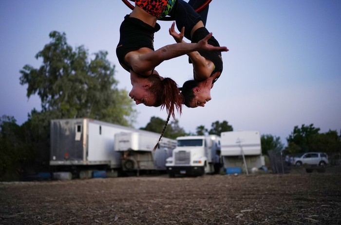 APTOPIX Virus Outbreak Vegas Entertainers Photo Gallery Lisa Varmbo Martonovich, left, and Nicole England-Czyzewski practice an aerial routine for