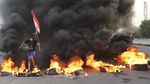 Aksi Ban Bakar Warnai Protes Kasus Korupsi di Irak