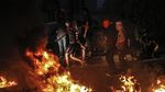 Aksi Ban Bakar Warnai Protes Kasus Korupsi di Irak