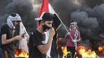 Aksi Ban Bakar Warnai Protes Kasus Korupsi di Irak