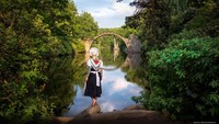 Foto Anita mengenakan pakaian tradisional Jerman di Saxony.  