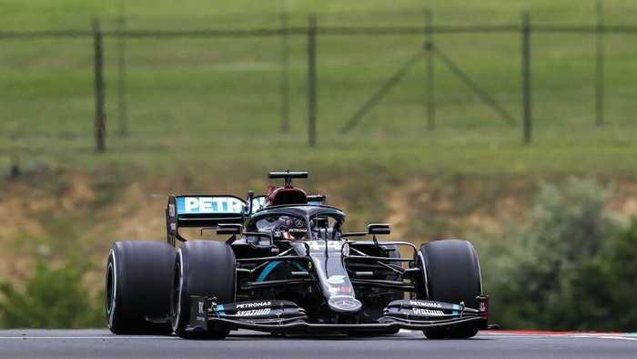 Mercedes driver Lewis Hamilton of Britain steers his car during the first practice session for the Hungarian Formula One Grand Prix at the Hungaroring racetrack in Mogyorod, Hungary, Friday, July 17, 2020. The Hungarian F1 Grand Prix will be held on Sunday. (Leonhard Foeger/Pool via AP)