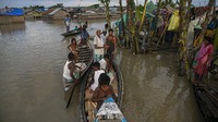 Setidaknya 50 orang tewas dan lebih dari dua juta terkena dampak banjir. AP/Anupam Nath  