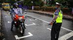 Ruang Henti Sepeda Motor di Lampu Lalu Lintas Ala MotoGP