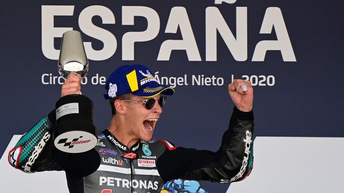 Petronas Yamaha SRTs French rider Fabio Quartararo celebrates on the podium after winning the MotoGP race of the Spanish Grand Prix at the Jerez racetrack in Jerez de la Frontera on July 19, 2020. (Photo by JAVIER SORIANO / AFP)