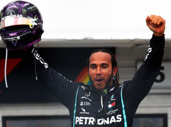 Lewis Hamilton BUDAPEST, HUNGARY - JULY 19: Race winner Lewis Hamilton of Great Britain and Mercedes GP celebrates in parc ferme after the Formula One Grand Prix of Hungary at Hungaroring on July 19, 2020 in Budapest, Hungary. (Photo by Leonhard Foeger/Pool via Getty Images)