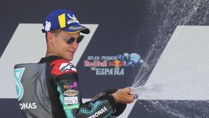 MotoGP rider Fabio Quartararo of France celebrates at the podium after winning the Spanish Motorcycle Grand Prix at the Angel Nieto racetrack in Jerez de la Frontera, Spain, Sunday, July 19, 2020. (AP Photo/David Clares)