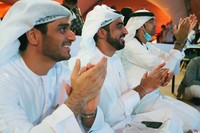 An Emirati man prepares to watch the launch of the 